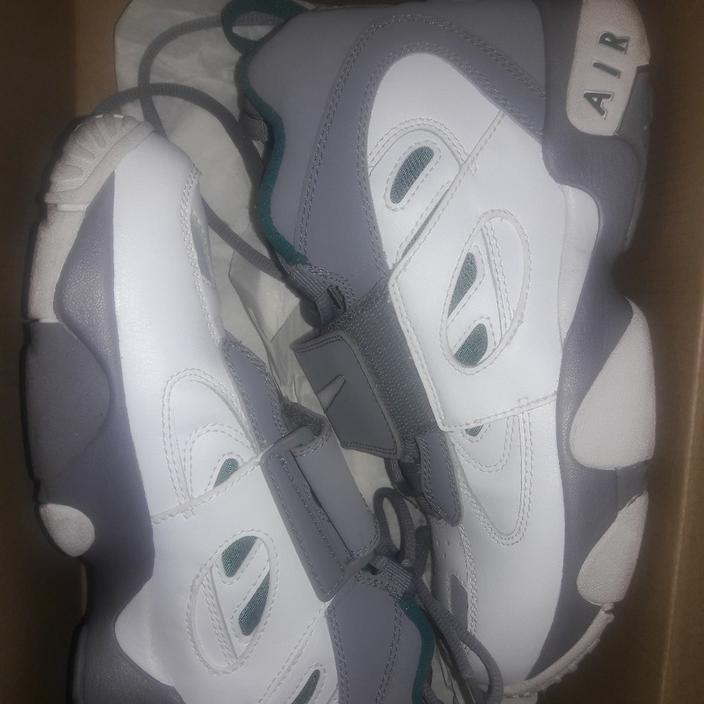 Teal, gray, and white tennis shoes